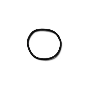 Close-up detail of a simple black elastic hair tie, ideal for daily minimalist styling.