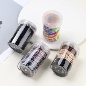 Canned high elasticity rubber hair bands, colorful hair ties in clear plastic jars for women.
