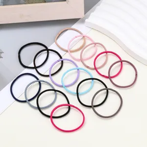 Detail view of colorful basic elastic hair ties, durable high elasticity for styling.