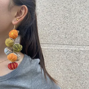 Pendientes largos de borla de calabaza de tela tejida otono Thanksgiving retro elegantes.