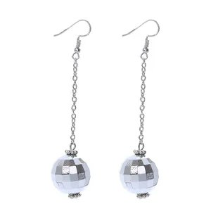 Silver disco ball dangle earring detail shot, vintage retro punk spherical drop pendant.