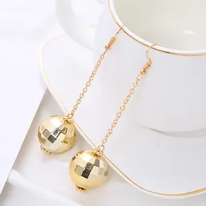 Gold disco ball dangling earrings detail, retro long chain ear hooks for women fashion jewelry.