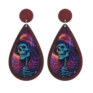 Halloween wooden skull drop earrings, unique gothic festival jewelry accessory for women.