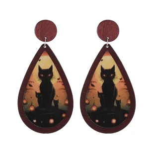 Halloween wooden teardrop earrings featuring spooky black cat and pumpkin design for party.