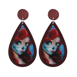 Halloween wooden teardrop earrings with spooky cartoon character graphic print for party wear.