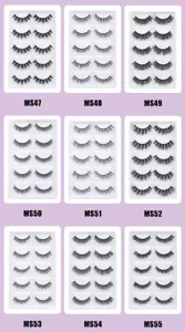 Detailansicht verschiedener künstlicher Wimpernstile in klaren Schalen mit dichtem Volumen.