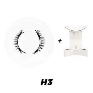 Detailansicht des magnetischen Wimpernsets mit weißem Applikator in runder Schachtel.