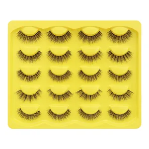 Großhandel mehrpaariges künstliches Wimpernset auf gelbem Tablett, natürlicher fluffiger Stil.