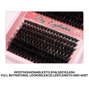 Close-up detail of DIY false eyelashes clusters in a pink tray, natural soft volume style.