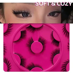 Close-up detail of cat-eye false eyelashes showcasing natural length, volume, and sleek black fibers.
