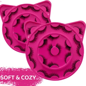 Pink cat ear false eyelash storage tray set with multiple pairs of dramatic lashes.