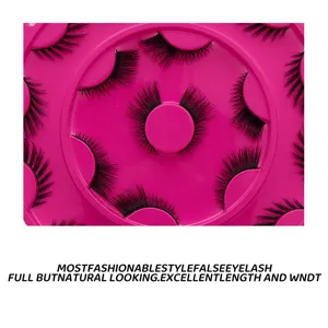 Detailed view of false eyelashes set in pink round tray, natural and thick style for daily use.