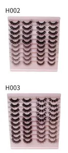 Großhandel 20 Paar flauschige russische Locken falsche Wimpern auf rosa Display-Tabletts.
