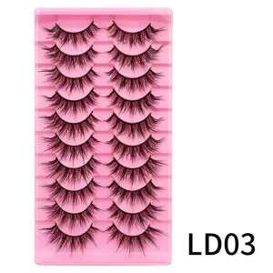 Detailansicht der 10 Paar künstlichen Wimpern auf rosa Schale mit L-Schwung natürlichem Design.