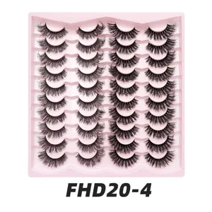 Detailansicht von 20 Paaren künstlichen Wimpern auf rosa Schale, dichtes Volumen.