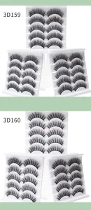 Nahaufnahme von 3D-Künstlichen Wimpern in mehreren Paaren auf weißen Kunststoff-Trays.