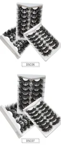 Detailansicht von mehrfachen langen dramatischen künstlichen Wimpern auf weissen Schalen.