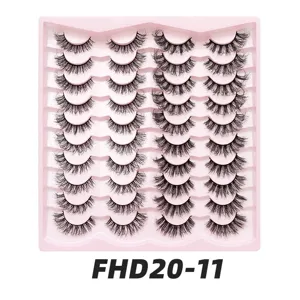 Nahaufnahme Detail von 20 Paar künstlichen Wimpern in rosa Schale, dichter Stil.