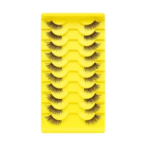 10 Paar halbe künstliche Wimpern Set mit transparentem Band auf hellem gelbem Tablett.