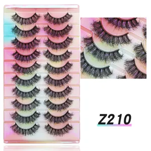 Detaillierte Nahaufnahme von 10 Paar dramatisch geschwungenen künstlichen Wimpern im Set.