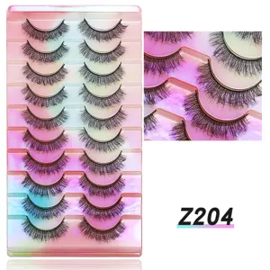 Detailansicht von 10 Paar künstlichen Wimpern, geschwungene Volumen-Wimpern in Palette.
