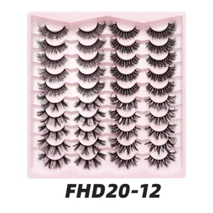 20 Paar künstliche Wimpern im Set auf rosa Schale, dicke und voluminöse Wimpern für Make-up.
