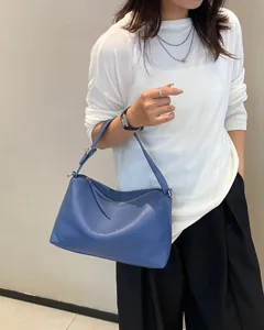 Casual genuine leather underarm shoulder bag for women, stylish niche design blue pillow bag.