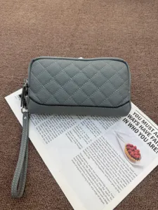 Grey genuine leather quilted long wallet with wrist strap, stylish phone clutch bag.