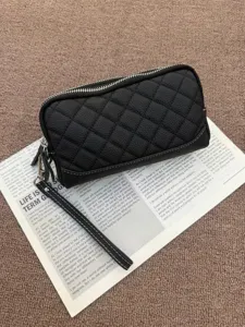 Black genuine leather long wallet with quilted design, double zippers and wrist strap for women.