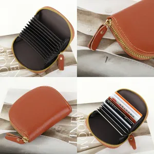 Genuine leather mini accordion card holder for women, compact coin purse with zip closure.