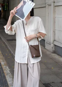 Genuine leather crossbody phone bag for women, versatile top layer cowhide commuter mini bucket bag.