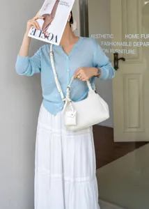 Elegant white leather shoulder bag with trendy mini pouch for women daily fashion.