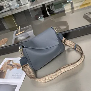 Genuine leather crossbody bag for women, stylish shoulder bag with wide strap, daily use.