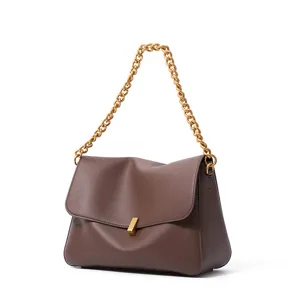 Elegant brown leather shoulder bag with chic gold chain strap and metal clasp for women