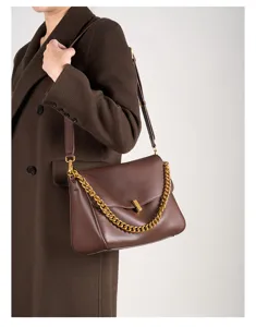 Brown leather shoulder bag detail, elegant chain strap and clasp design for daily commute.