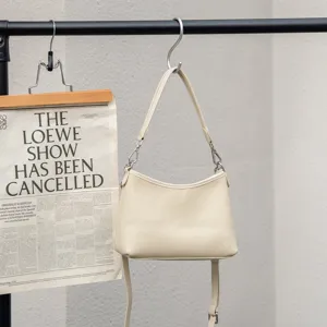 Beige leather shoulder bag, stylish casual crossbody bag with adjustable strap for women.