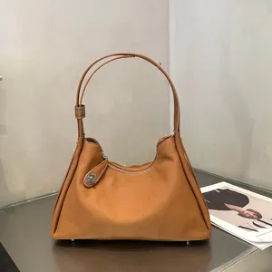 Genuine leather shoulder bag for women, large capacity hobo tote with stylish side lock.