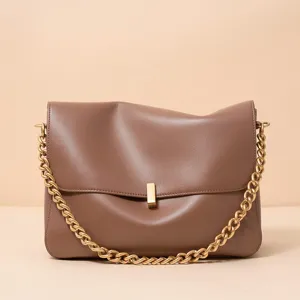 Brown leather shoulder bag for women, chic large capacity commuter crossbody chain bag.