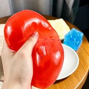 Transparent red silicone squeeze toy stress relief fidget toy with vaseline filling.