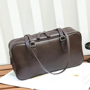 Close-up of retro brown leather shoulder bag, minimalist baguette style, fine texture details.