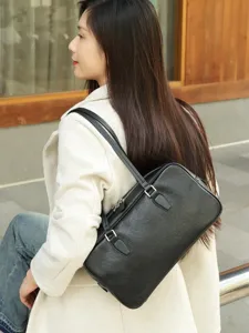Classic black genuine leather shoulder bag, retro baguette style handbag for daily wear.