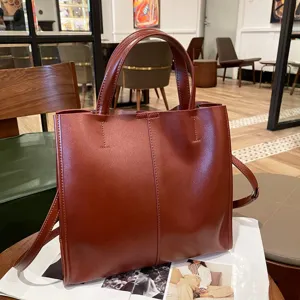 Classic brown leather tote bag for women, stylish retro vegetable-tanned shoulder handbag.