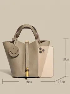 Classic genuine leather bucket bag luxury top layer cowhide handbag with lock charm