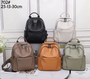 Genuine leather backpack for women, soft cowhide casual daypack, large capacity travel school bag.