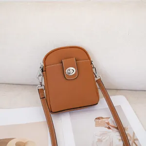Genuine leather vertical phone bag, fashionable mini crossbody shoulder bag for women daily use.