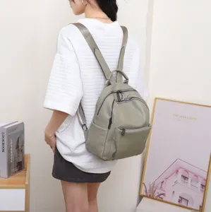 Genuine leather backpack for women, casual soft cowhide school bag with large capacity.