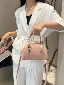 Hermoso bolso de mano bowling de cuero rosa, elegante bolso cruzado de hombro para mujer.