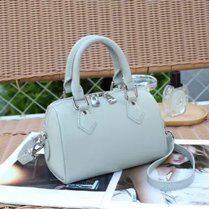 Details of the genuine leather Boston bag, soft cowhide crossbody pillow handbag for women.