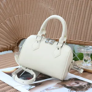 Genuine leather Boston bag for women, soft cowhide crossbody handbag with top handle and zippers.