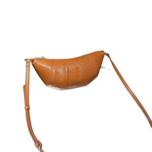 Genuine leather croissant crossbody bag for women, stylish brown shoulder dumpling bag commute.